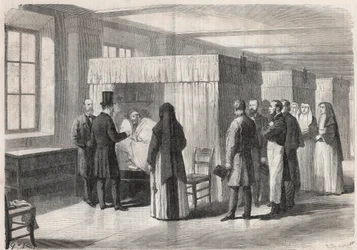 El emperador Napoleón III (1808-1873) visita las salas del Hotel Dieu para pacientes con cólera y habla con ellos - Grabado en "Le Monde Illustré"
