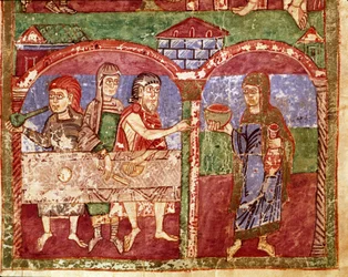 Episodio de la vida de Santa Radegunda (Radegundis) de Poitiers (519-587), esposa de Clotario I, rey de los francos: Radegunda durante sus obras de caridad sirve en la mesa de los pobres. Miniatura de un manuscrito del siglo XI. Biblioteca Municipal de Poi