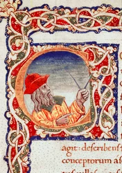 El astrónomo griego Claudio Ptolomeo (Claudius Ptolemaeus) (hacia 90-hacia 168 d. C.) usando un compás para realizar cálculos. Miniatura tomada de la «Cosmographia» (Ms. V.F. 32 f.2r), Nápoles, Biblioteca Nacional