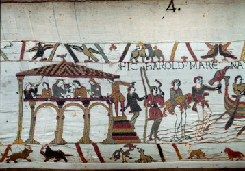 Harold es enviado por el Rey de Inglaterra Eduardo el Confesor a Normandía para informar al Duque Guillermo el Conquistador (1027-1087) que será su sucesor en la Corona de Inglaterra: la última comida en tierra antes de embarcar hacia Normandía. Detalle de