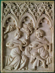 Tabla de marfil representando a dos músicos. Siglo XIV.