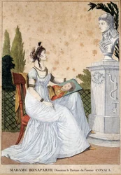 Madame Bonaparte dibujando el retrato del Primer Cónsul Josefina de Beauharnais (1763-1814) frente al busto de su esposo Napoleón Bonaparte (1769-1821). Estampa anónima. 1799-1804.