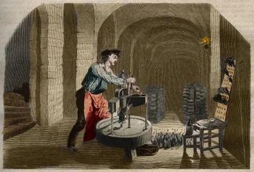 Fabricación de vino espumoso de Champagne: máquina embotelladora utilizada en una bodega. Grabado de 1858 en "Le Musée Des Sciences".