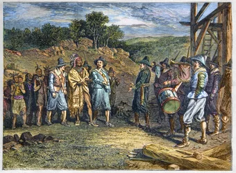 Población nativa de América: Indios. Los colonos se encontraron con Massasoit (1590-1661) también conocido como Ousamequin “Pluma Amarilla” jefe de la tribu Wampanoag, Colonia de Plymouth, años 1620. El líder Wampanoag Massasoit visitando a los colonos en 
