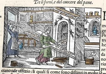 Preparación y horneado de pan en un horno. Grabado de Olaus Magnus, “Historia de Gentis Septentrionalibus”, Venecia