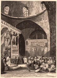 Rabino y congregación en una sinagoga en Jerusalén