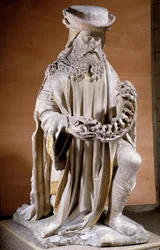 Representación de José de Arimatea Escultura en piedra del siglo XVI