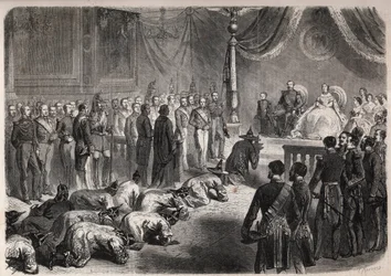 Embajadores de Siam se arrastran hacia la familia imperial francesa durante una audiencia solemne en Fontainebleau en presencia de Napoleón III y Eugenia de Montijo