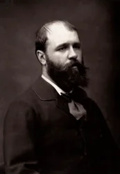 El artista Jean-Jacques Scherrer fotografiado con motivo del Salón de París de 1881