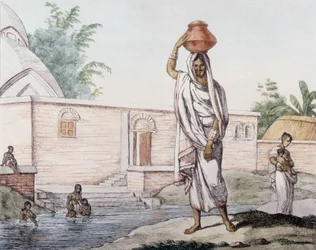 Aguador cerca del Hooghly (río indio) en Calcuta (o Kolkata), India