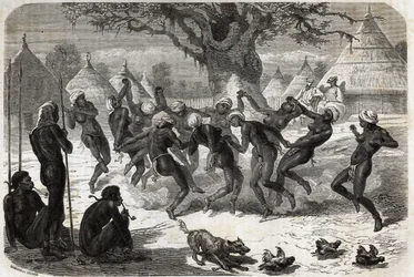 Danza de bienvenida por las mujeres de la tribu, al regreso de Baker y su esposa del Lago Alberto (Albert Nyanza). Grabado para ilustrar el viaje al lago Alberto, en 1861-1864, de Sir Samuel White Baker, en “Le tour du monde, nouveau journal des voyages