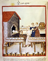 Pan negro: un panadero trabajando frente a un horno. Iluminación del "Tacuinum sanitatis"
