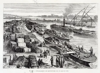 Descarga de mercancías en un muelle del Canal de Suez