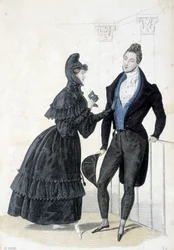 Placa que ilustra la moda masculina y femenina de la década de 1830. La mujer lleva un vestido con capucha y sostiene una máscara de baile en sus manos