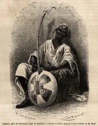Sambou, el griot de Niantanso (Malí) (tipo Malinke: lengua de África Occidental (Guinea, Senegal, Malí y Costa de Marfil), poeta, músico, historiador y narrador, el griot es el depositario de la memoria colectiva de un pueblo. Grabado para ilustrar la hist