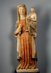 Virgen y Niño. La Virgen sostiene una paloma en la mano