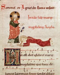 Lavado de los pies: María Magdalena apoyada en los pies de Cristo. Miniatura de un antifonario gradual (tropair) (ms. 65) siglo XII Piacenza, Biblioteca Capitolare