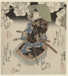 Samurai parado bajo los cerezos