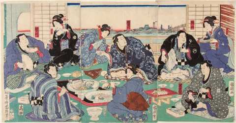 El luchador de sumo Sakaigawa Namiemon (a la izquierda) con otros luchadores y geishas en una fiesta