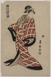 Segawa Michinosuke con una bata acolchada a cuadros