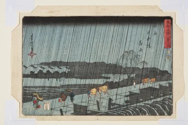 Lluvia nocturna en Yoshiwara Nihondzutsumi (Yoshiwara Nihondzutsumi Yau) (grabado en madera en color)