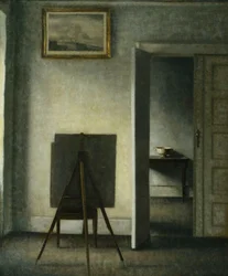 Un interior con el caballete del artista