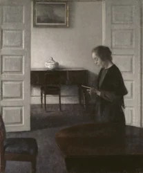 Interior con una dama leyendo