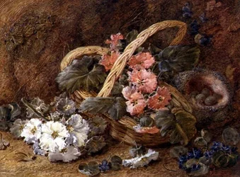 Un nido de pájaros y una cesta de flores
