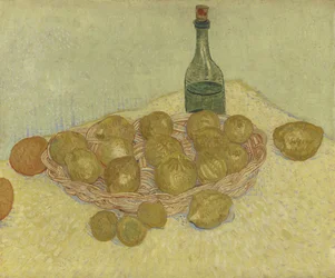Cesta de limones y botella