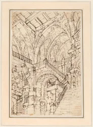 Interior de una prisión con una escalera monumental