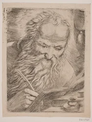 Un anciano escribiendo en un libro
