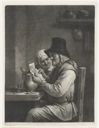 Hombre y mujer leyendo una carta