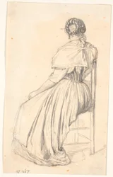 Italiana sentada en una silla, vista desde atrás