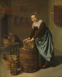 Mujer fregando un recipiente