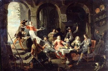Compañía elegante festejando en un interior con sirvientes en asistencia
