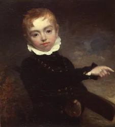 Niño con un bate de cricket