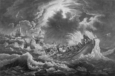 Bote salvavidas en el acto de salvar parte de la tripulación de un barco