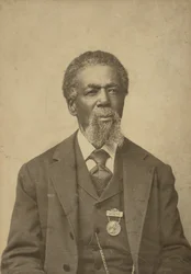 Retrato en tarjeta de gabinete de Thomas Mundy Peterson, 1884