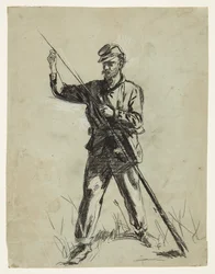 Soldado de caballería cargando un rifle