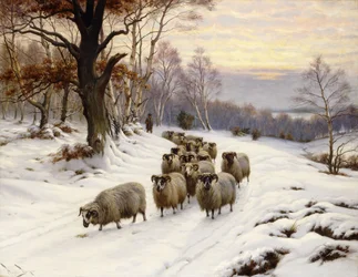 Un pastor y su rebaño en un camino en invierno