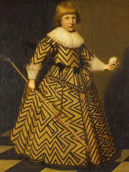 Retrato de un niño con un palo de kolf
