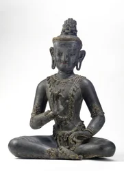 Bodhisattva de estilo nepalés-chino (laca, tela, trazas de pintura azul, dorada y verde y hoja de oro)