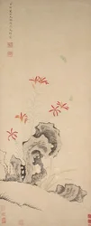 Roca, lirio tigre y orquídea