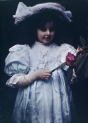 Niña con un vestido blanco