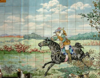 Vista interior, panel de azulejos, pintor Furcy Ernest Tondeur, ejecutor Boch Frères La Louvière, segundo panel muestra escena de caza con jinete galopando con cuerno de caza