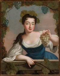 Mujer con un racimo de uvas