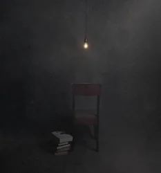 Habitación a oscuras, silla vacía